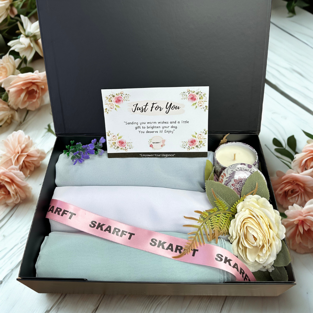 3 Hijabs in a black box with scented candle and flowers