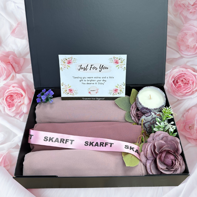 3 Pink Hijabs in a black box with scented candle and flowers